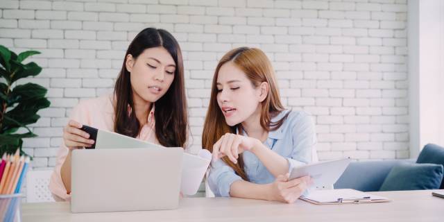 attractive-smart-creative-asian-business-women-smart-casual-wear-working-laptop-while-sitting-2.jpg